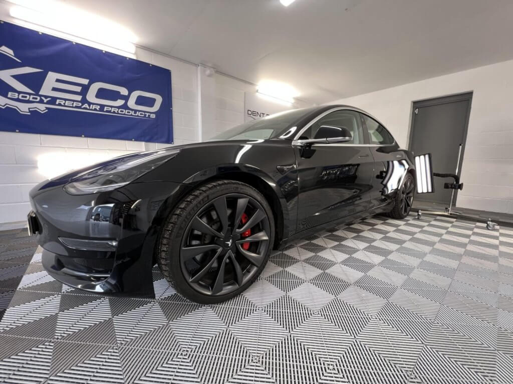 tesla dent repair in a leyland workshop